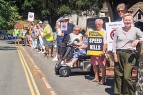 Green councillors Emily O'Brien and Johnny Denis with Ringmer residents outside St Mary's Church to call for 'No HGVs' in the conservation area. Photo: Lewes District Green Party