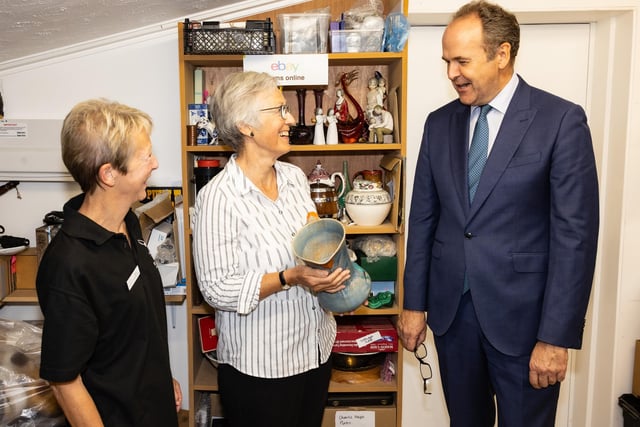 The Lord-Lieutenant of East Sussex with Fran (volunteer) and Angela Woodall (Online Shop Manager) at Raystede online shop