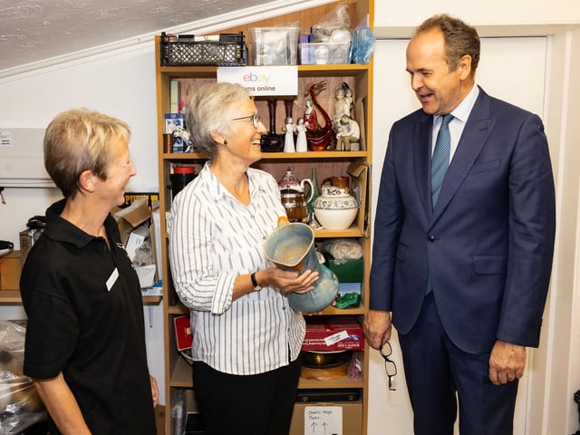 The Lord-Lieutenant of East Sussex with Fran (volunteer) and Angela Woodall (Online Shop Manager) at Raystede online shop