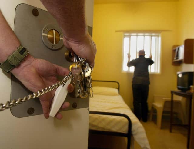 File photo dated 07/11/03 of a prison cell, as private firms are better at running prisons than the public sector and all jails should be subject to open competition, an independent think tank said today.