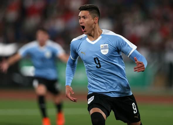 Uruguay's Darwin Nunez celebrates after scoring against Peru during a Lima 2019 Pan American Games Group B football match in Lima on July 29, 2019. (Photo by LUKA GONZALES / AFP)