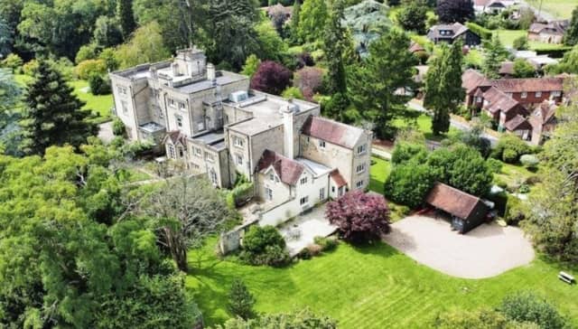 Hawkhurst Court - the wing of a former manor house at Wisborough Green - is on the market with a guide price of £850,000