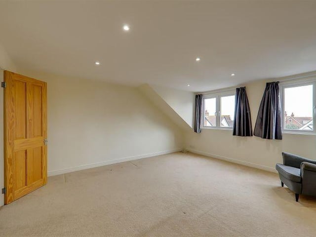 A second-floor room that could be a bedroom, playroom or lounge
