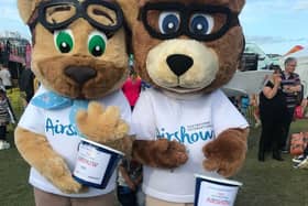 Ace and Aimee Air Bear collecting money at Airbourne
