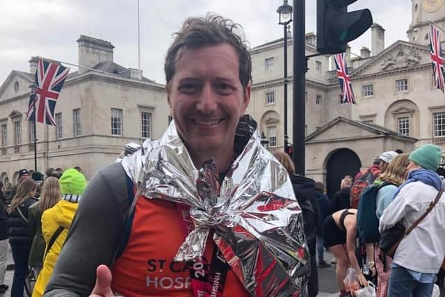 Chris Francis with his London Marathon medal 