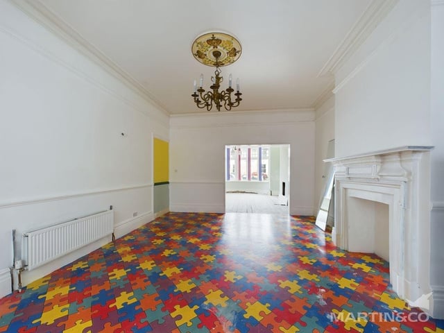 The former Butterfly House Day Nursery in Littlehampton is a five-bedroom, semi-detached house that is now on the market with Martin & Co at £695,000