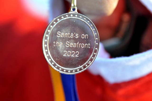 Santas on the Seafront run to raise money for MND. Pic S Robards SR2212102