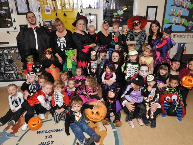 Children and staff at Just Learning nursery dressed up for Halloween in 2013.