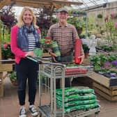 Sarah Hilton from Friends of Windmills School in Hassocks at family-run South Downs Nurseries with Clive Gravett, founder of The Budding Foundation.