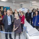 UHSussex colleagues and partners gather for the official ribbon cutting