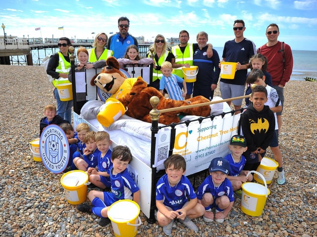 Worthing United Youth Football Clubs 30 teams took turns to push a bed along Worthing seafront to raise money for Chestnut Tree House