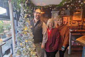 David Villiers, manager at The Brooksteed, and Margaret Howard and Lindsay Scott from Broadwater Support Group & Community Hub with the naked Christmas tree they would like the community to decorate to raise money for a replacement defibrillator