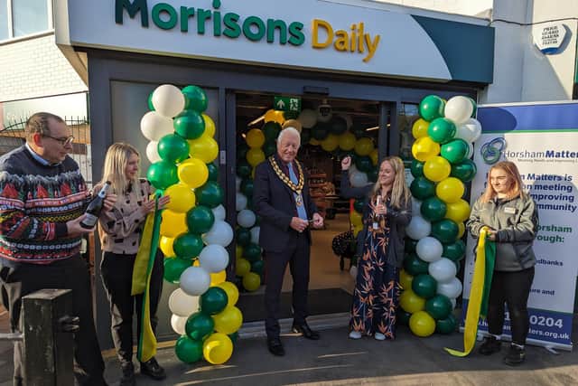 Horsham District Council chairman David Skipp cuts the ribbon at the launch of Morrisons' special fun day charity fundraiser