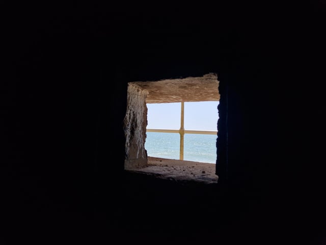 Pete Coe, one of the project leaders, and fellow former Royal Engineer Graham Cosham worked together to open the southern embrasure at the Ferring pillbox