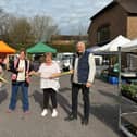 Philippa, Miranda, Lisa and Chris cutting the Ribbon to open Herstmonceux village market.