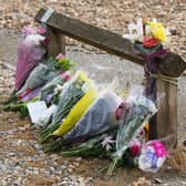 Flowers laid at the scene. Photo: Eddie Mitchell