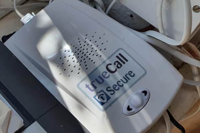 A Rother Police spokesperson said: “This afternoon we've fitted a TrueCall phone blocker device. This ensures that a vulnerable victim in our community isn’t subjected to any further scam phone calls.” Picture from Rother Police's Twitter page.