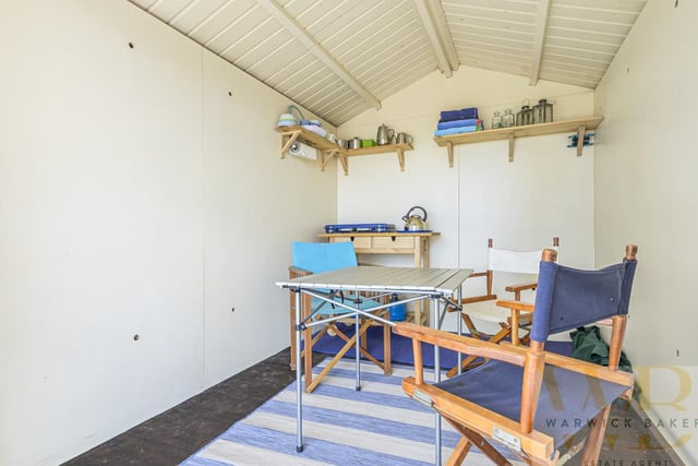 The eventual buyers fended off competition by purchasing the white beach hut for £65,000 - £15,000 above the asking price. Photo: Warwick Baker estate agents