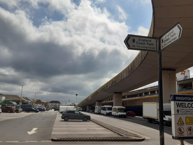 With the Asda car park in front of you, turn left at the England Coastal Path sign