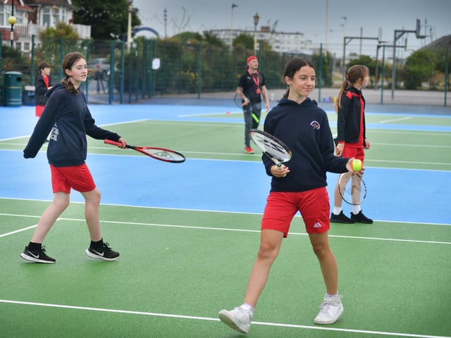 Culture Secretary Lucy Frazer marks the refurbishment of 1,000 public tennis courts. Photocall on June 29 at the tennis courts on Royal Parade, Eastbourne, with children from Bourne Primary School and Scott Lloyd, CEO Lawn Tennis Association.