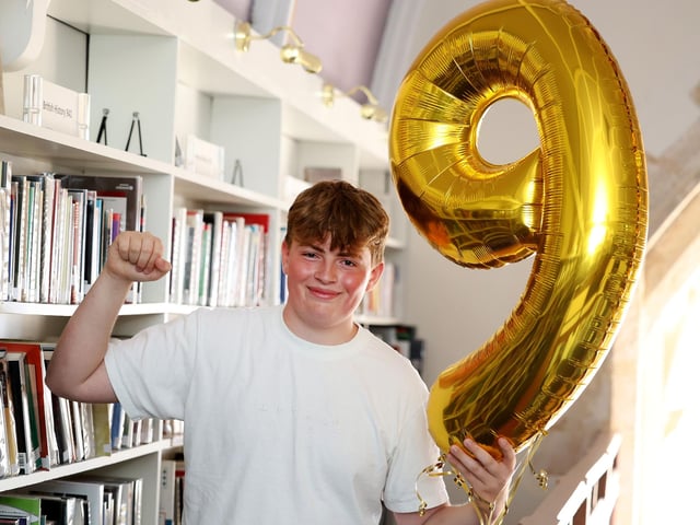 Nathanial celebrates achieving the top English Literature GCSE mark in the country