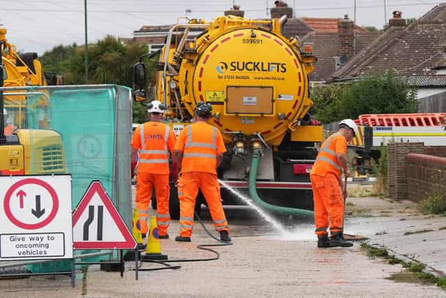 Southern Water contractors on the scene in West Way, Lancing. Picture: Eddie Mitchell