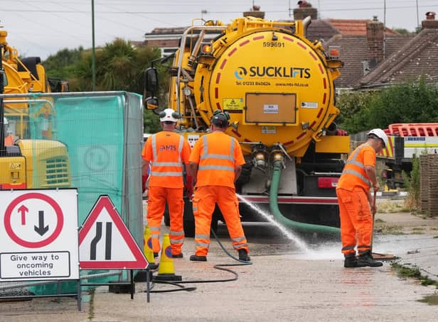 Southern Water contractors on the scene in West Way, Lancing. Picture: Eddie Mitchell