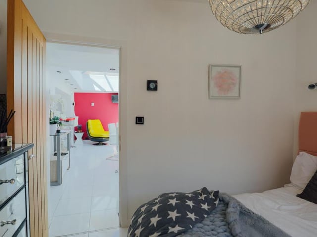 This is one of two downstairs rooms that could be used as a bedroom.