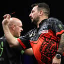 Jonny Clayton produced a stunning comeback to win the night in Brighton, overturning a two-break deficit to beat Michael van Gerwen in a dramatic Premier League darts final. Photo: Taylor Lanning/PDC