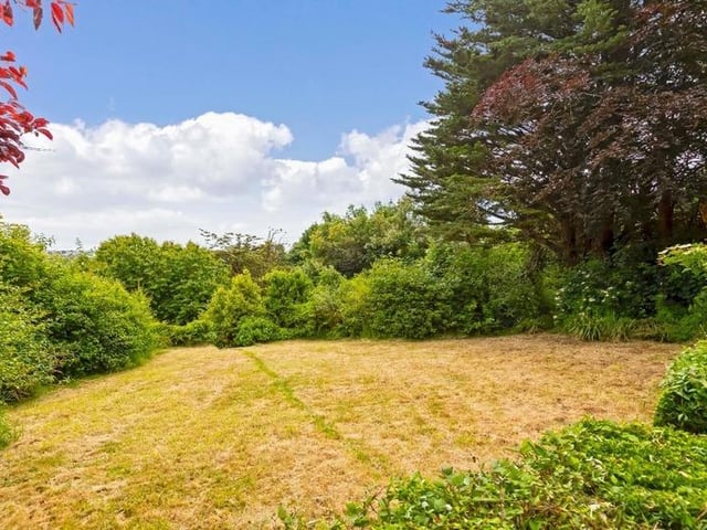 This substantial detached family house sits on the highest point in North Lancing, with grounds totalling 0.5 acres of land. Offers in the region of £1million are invited for this four-bedroom property at the foot of the South Downs National Park, with magnificent panoramic coastal views.