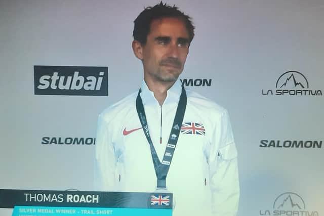Thomas Roach on the podium