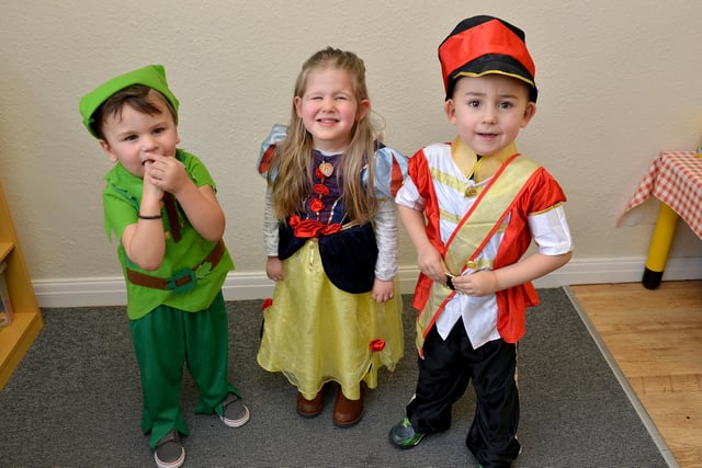 Joshua, Lily and Brantly enjoying World Book Day at Stepping Stones Day Nursery in March 2016