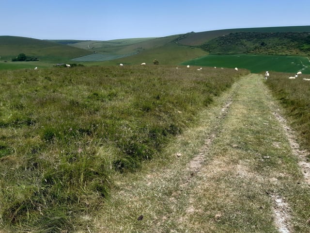 After that, there is supposed to be a straight path down the hill but it is impossible to see. Best advice is follow the wide, clear footpath to the right as it winds down the hill.