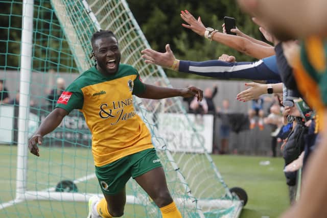Dan Ajakaiye celebrates his late Horsham winner against Dulwich Hamlet. Pictures by John Lines