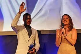 Brighton and Hove Albion midfielder Moises Caicedo receives his player of the year award