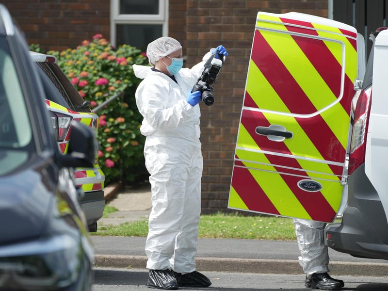 Forensic experts at the scene in Horsham