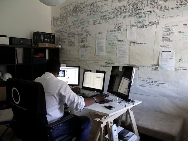 Ajit Chambers operations wall, where meetings can 'see' the 'how are we going to do this' work.