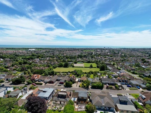 This substantial detached family house sits on the highest point in North Lancing, with grounds totalling 0.5 acres of land. Offers in the region of £1million are invited for this four-bedroom property at the foot of the South Downs National Park, with magnificent panoramic coastal views.