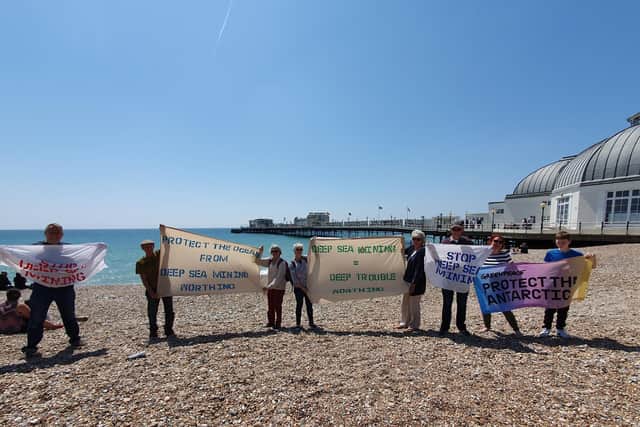 The peaceful protest against the UK Government – by volunteers from Greenpeace Arun and Adur Group – happened on Worthing seafront on Saturday (June 3). Photo: Greenpeace Arun and Adur Group