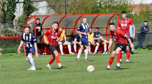 Action from Wick's home defeat to Godalming in the SCFL Division 1 at Crabtree Park