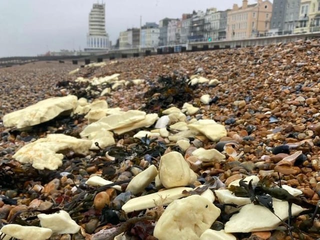 Beach clean up after plastic foam washes ashore