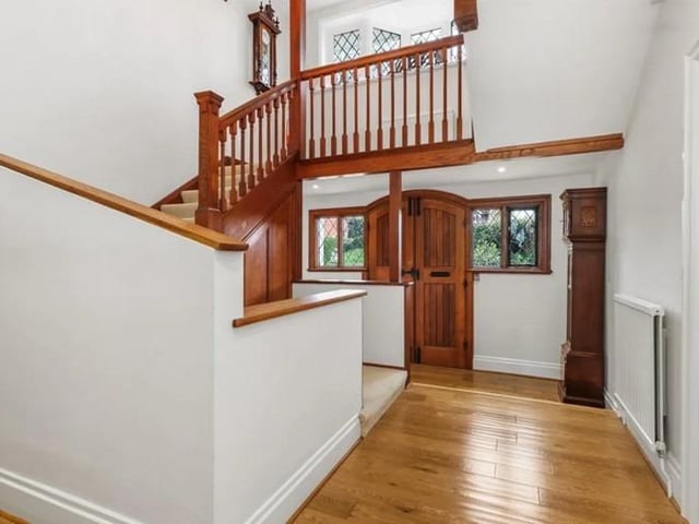 The impressive traditional wooden front double doors open into a welcoming entrance hall which draws you immediately to the eye catching wooden stair case, galleried landing and double height ceilings.