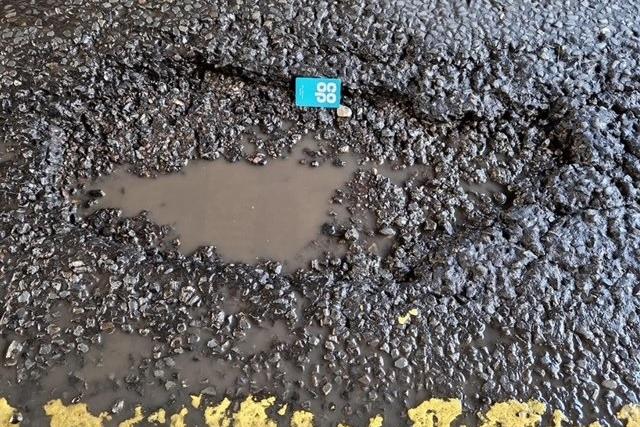 Hard to see pothole under the bridge in Braybrooke Road