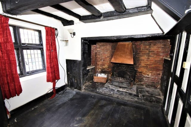 The period cottage has an inglenook fireplace