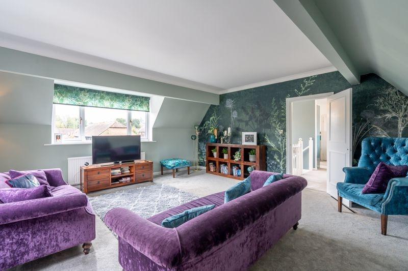 The spacious living room leaves plenty of space to relax and entertain.