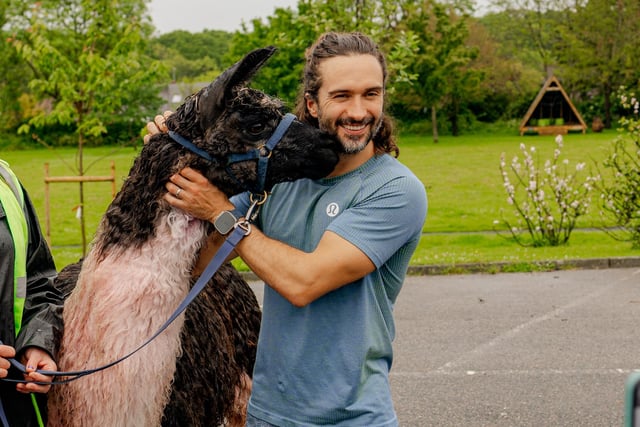 The Body Coach with the school's resident llama