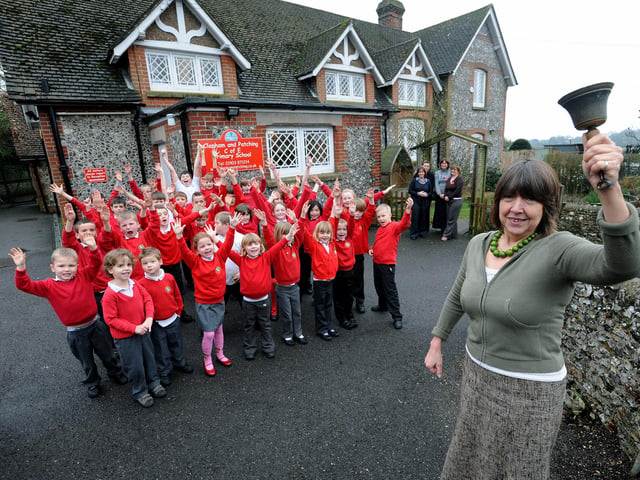 Head teacher Jane Jones ringing the bell on a successful Ofsted in 2011