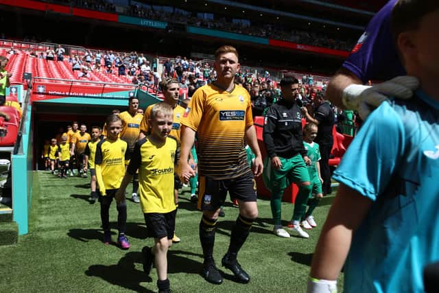 Littlehampton Town walk out of the tunnel at Wembley