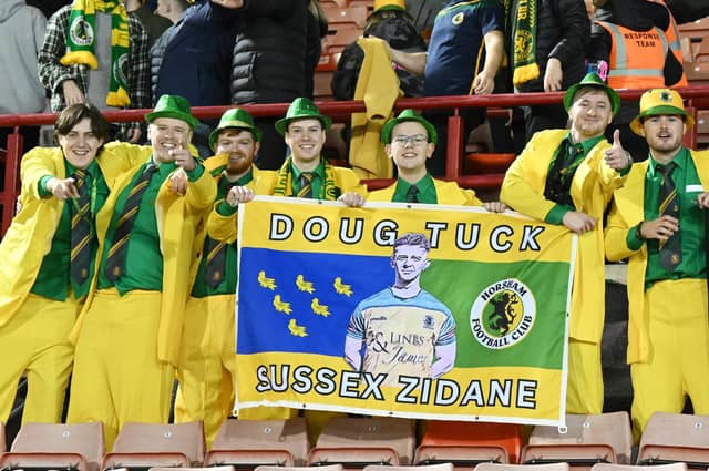 Horsham fans celebrating after the Emirates FA Cup First Round match between Barnsley and Horsham at Oakwell Stadium.