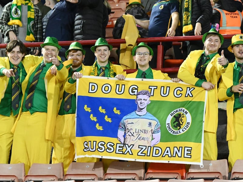 Horsham fans celebrating after the Emirates FA Cup First Round match between Barnsley and Horsham at Oakwell Stadium.